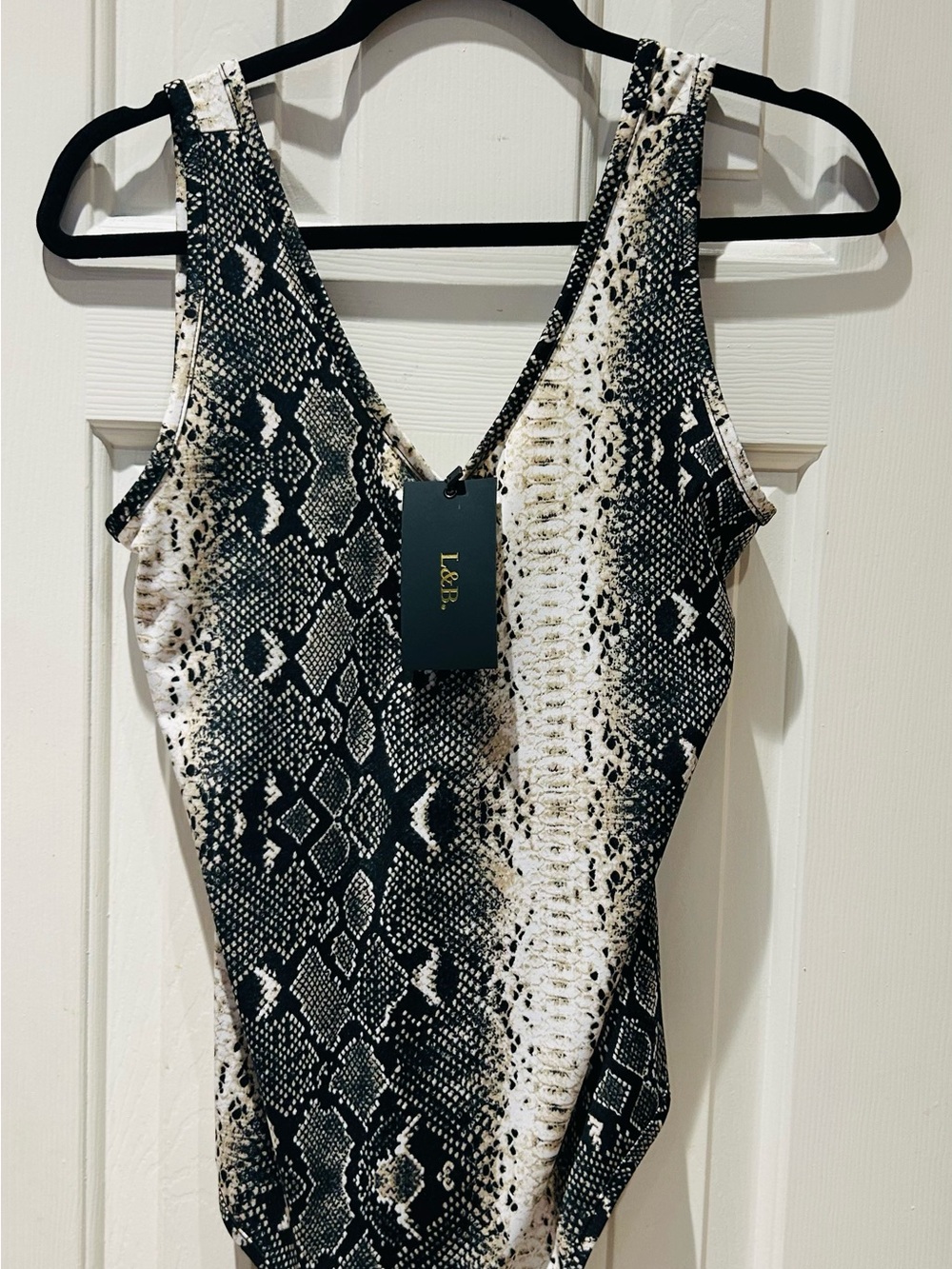 L&B Black Cream Snake-Print One-Piece bodysuit